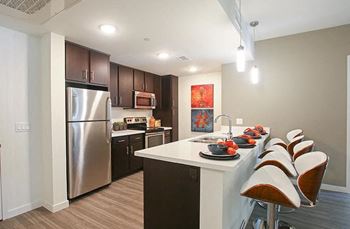 Kitchen island or peninsula with quartz counter tops